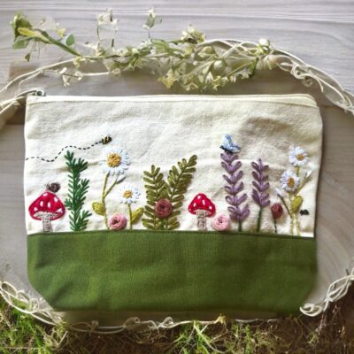 Hand-embroidered zippered pouch