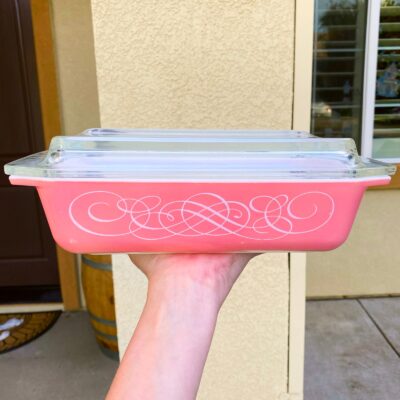 Vintage Pyrex pink scroll space saver with lid