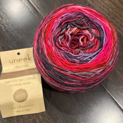 Urth Yarns Uneek hand dyed self-striping merino blend purple reds