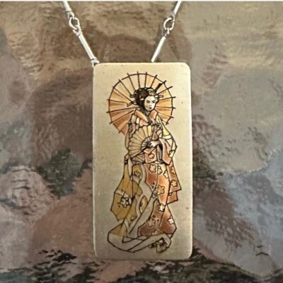 Reed and Barton silver damascene geisha pendant