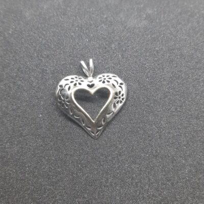 Sterling silver,  10kt gold heart pendent