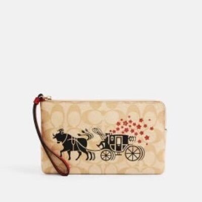 Coach Lunar New Year Corner Zip Wristlet In Signature Canvas W/ Ox & Carriage