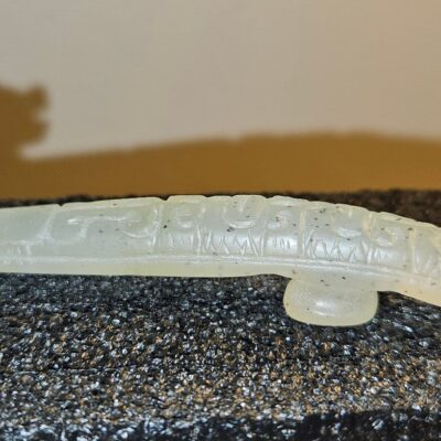 A Qing Celadon Jade Dragon Belt Hook 清十八世紀 青玉龍紋帶鉤﻿