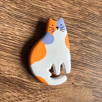 rare ceramic calico cat Hallmark magnet.  Condition: preowned but i